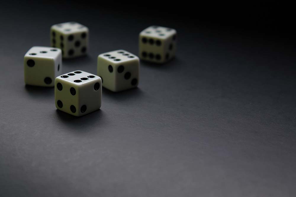 image of dice on dark background